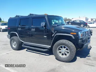 2003 Hummer H2 z VIN 5GRGN23U63H117676, wystawiony jako IAAI lot #41816411 z przebiegiem Nie podano mil oraz . Historia ofert i sprzedaży dostępna na DreamBid. Obrazek 13.