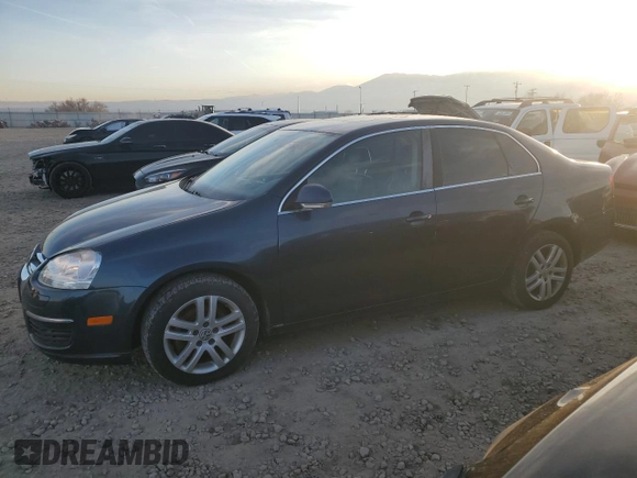 2007 Volkswagen Jetta z VIN 3VWDG71K27M010409, wystawiony jako Copart lot #84155424 z przebiegiem 140 665 mil mil oraz Czysty tytuł • Clean title. Historia ofert i sprzedaży dostępna na DreamBid. Obrazek 1.