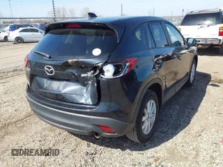 2013 Mazda CX-5 Touring with VIN JM3KE2CE3D0102368, listed as a IAAI auction lot 41783079 with 162,646 mi miles and . Bid and sale history available at carsss.com. Image 4.