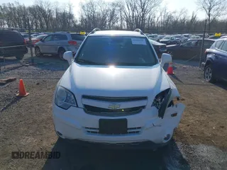 2014 Chevrolet Captiva Sport LT z VIN 3GNAL3EK8ES557432, wystawiony jako IAAI lot #42018256 z przebiegiem 92 569 mil mil oraz . Historia ofert i sprzedaży dostępna na DreamBid. Obrazek 12.