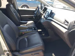 2018 Honda Odyssey Touring with VIN 5FNRL6H81JB022975, listed as a IAAI auction lot 42653304 with 210,137 mi miles and . Bid and sale history available at DreamBid. Image 5.