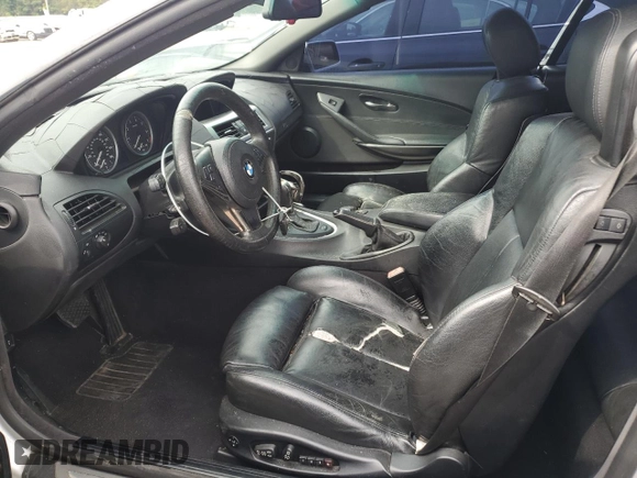 2006 BMW 6 Series 650Ci z VIN WBAEK13406CN75613, wystawiony jako Copart lot #56288515 z przebiegiem 191 640 mil mil oraz Szkoda całkowita • Salvage title. Historia ofert i sprzedaży dostępna na DreamBid. Obrazek 7.
