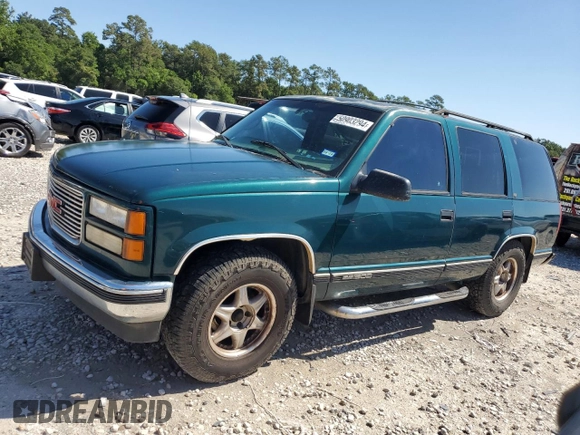 1999 GMC Yukon with VIN 1GKEC13R8XJ792078, listed as a Copart auction lot 50903294 with 232,672 mi miles and Salvage Title. Bid and sale history available at carsss.com. Image 1.