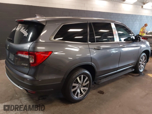 2022 Honda Pilot EX-L with VIN 5FNYF6H59NB000754, listed as a IAAI auction lot 42090576 with 32,813 mi miles and . Bid and sale history available at DreamBid. Image 4.