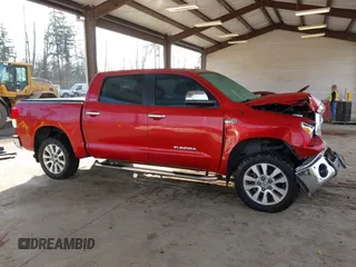 2012 Toyota Tundra 4WD Truck LTD with VIN 5TFHW5F13CX268552, listed as a IAAI auction lot 41461707 with 199,502 mi miles. Bid and sale history available at carsss.com. Image 13.