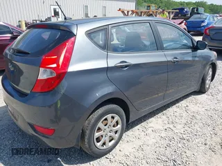 2013 Hyundai Accent GS with VIN KMHCT5AE7DU094139, listed as a IAAI auction lot 42312906 with 160,146 mi miles and . Bid and sale history available at DreamBid. Image 4.