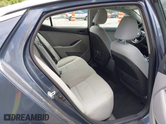 2015 Kia Optima LX with VIN 5XXGM4A75FG433164, listed as a IAAI auction lot 42537071 with 147,214 mi miles and . Bid and sale history available at DreamBid. Image 8.