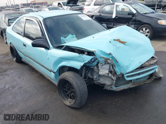 1998 Honda Civic HX with VIN 1HGEJ7127WL127977, listed as a IAAI auction lot 41230187 with 182,000 mi miles. Bid and sale history available at carsss.com. Image 1.