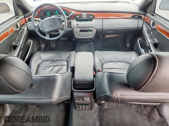 2004 Cadillac DeVille z VIN 1G6KD54Y04U111840, wystawiony jako Copart lot #56712195 z przebiegiem 60 378 mil mil oraz Szkody całkowita. Historia ofert i sprzedaży dostępna na DreamBid. Obrazek 8.