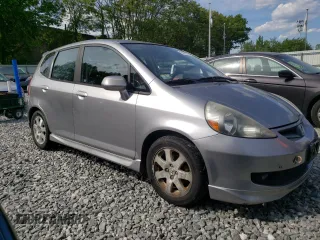 2007 Honda Fit Sport z VIN JHMGD37677S001013, wystawiony jako Copart lot #58792605 z przebiegiem 157 960 mil mil oraz Czysty tytuł • Clean title. Historia ofert i sprzedaży dostępna na DreamBid. Obrazek 4.
