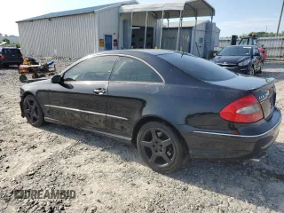 2006 Mercedes-Benz CLK 500 with VIN WDBTJ75J16F195745, listed as a Copart auction lot 56946894 with 239,874 mi miles and Salvage Title. Bid and sale history available at carsss.com. Image 2.