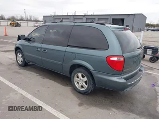 2005 Dodge Caravan SXT with VIN 2D4GP44LX5R115310, listed as a IAAI auction lot 41668454 with 115,784 mi miles and . Bid and sale history available at DreamBid. Image 3.