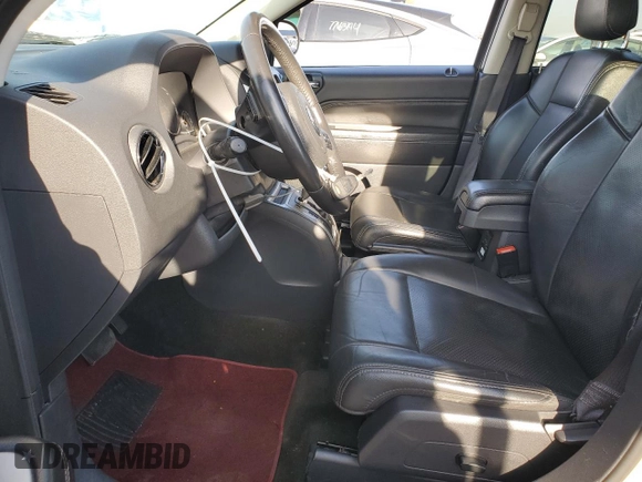 2016 Jeep Compass Latitude with VIN 1C4NJDEB9GD764730, listed as a Copart auction lot 76808544 with 123,937 mi miles and Clean Title. Bid and sale history available at carsss.com. Image 7.