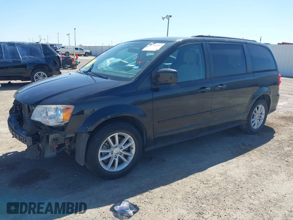 2016 Dodge Grand Caravan SXT with VIN 2C4RDGCG0GR387856, listed as a IAAI auction lot 41769163 with 103,856 mi miles and . Bid and sale history available at DreamBid. Image 2.