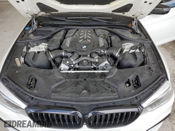 2020 BMW 5 Series M550i xDrive z VIN WBAJS7C07LBN96328, wystawiony jako Copart lot #52234045 z przebiegiem 46 515 mil mil oraz Nie do naprawy • Non repairable. Historia ofert i sprzedaży dostępna na DreamBid. Obrazek 11.