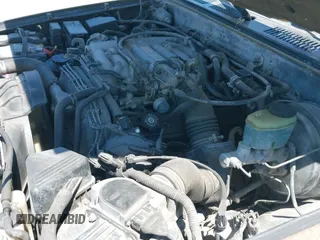 1994 Toyota 4Runner z VIN JT3VN39W4R8061399, wystawiony jako IAAI lot #42455341 z przebiegiem 177 038 mil mil oraz . Historia ofert i sprzedaży dostępna na DreamBid. Obrazek 13.