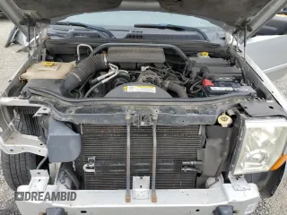 2010 Jeep Commander Sport with VIN 1J4RG4GK2AC121821, listed as a Copart auction lot 57793545 with 171,405 mi miles and Salvage title. Bid and sale history available at DreamBid. Image 12.