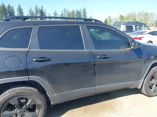2015 Jeep Cherokee North with VIN 1C4PJMCS3FW777973, listed as a IAAI auction lot 42043203 with 158,536 mi miles. Bid and sale history available at carsss.com. Image 14.