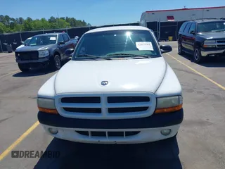 1999 Dodge Dakota SLT z VIN 1B7GL22X0XS193423, wystawiony jako IAAI lot #42053562 z przebiegiem 209 802 mil mil oraz . Historia ofert i sprzedaży dostępna na DreamBid. Obrazek 12.