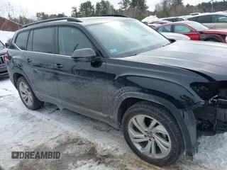 2023 Volkswagen Atlas SE z VIN 1V2KR2CA9PC502284, wystawiony jako IAAI lot #41614137 z przebiegiem 19 122 mil mil oraz . Historia ofert i sprzedaży dostępna na DreamBid. Obrazek 13.