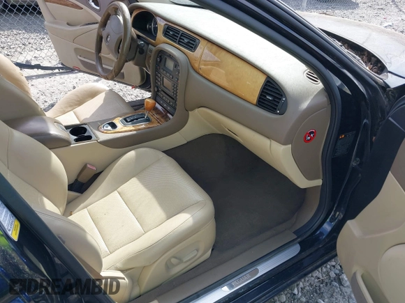 2005 Jaguar S-Type with VIN SAJWA01T15FN16454, listed as a IAAI auction lot 41650066 with 104,942 mi miles and . Bid and sale history available at DreamBid. Image 5.