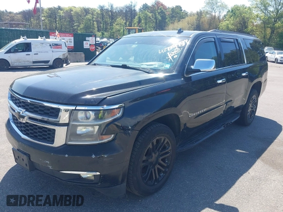 2015 Chevrolet Suburban LT with VIN 1GNSKJKC5FR275357, listed as a IAAI auction lot 42229934 with 359,009 mi miles and . Bid and sale history available at DreamBid. Image 18.