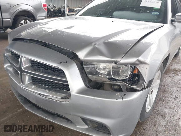 2014 Dodge Charger SE with VIN 2C3CDXBG5EH363292, listed as a IAAI auction lot 41888279 with 129,128 mi miles. Bid and sale history available at carsss.com. Image 6.