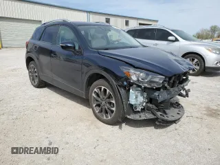 2016 Mazda CX-5 Grand Touring with VIN JM3KE4DYXG0844002, listed as a Copart auction lot 52712035 with 81,042 mi miles and Salvage Title. Bid and sale history available at DreamBid. Image 4.