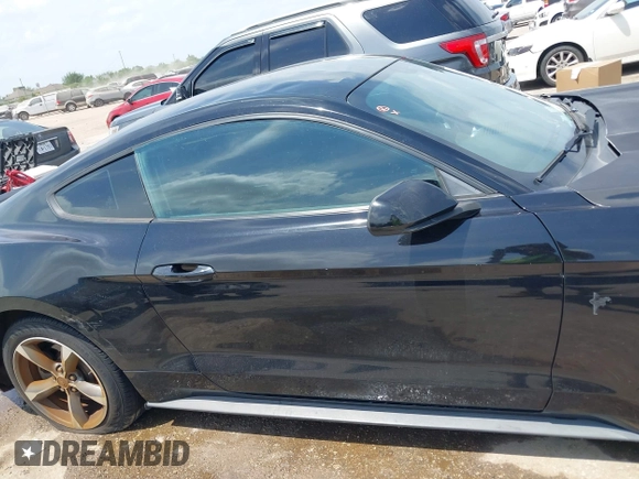 2015 Ford Mustang V6 with VIN 1FA6P8AM3F5392995, listed as a IAAI auction lot 42063188 with 128,854 mi miles and . Bid and sale history available at DreamBid. Image 13.