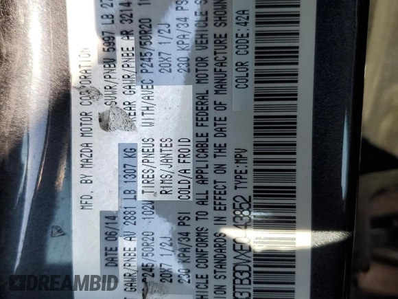 2014 Mazda CX-9 Grand Touring with VIN JM3TB3DVXE0443852, listed as a Copart auction lot 59106525 with 101,969 mi miles and Salvage title. Bid and sale history available at DreamBid. Image 13.