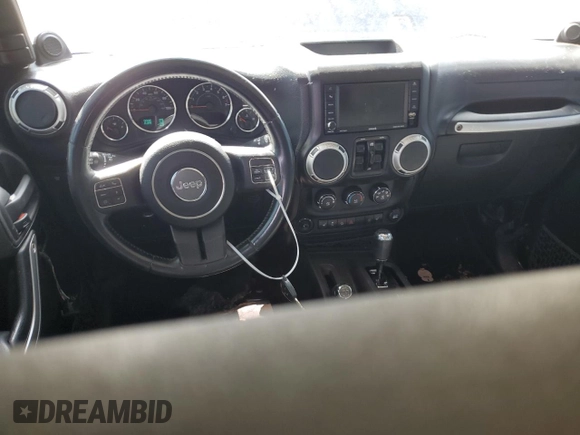 2014 Jeep Wrangler Unlimited Rubicon X с VIN 1C4HJWFG0EL142071, выставлен на аукционе Copart как лот 72898994 с пробегом 110 597 миль миль и Списание • Salvage title. История ставок и продаж доступна на DreamBid. Изображение 8.