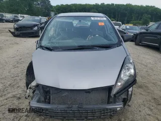 2009 Honda Fit with VIN JHMGE88249S025083, listed as a Copart auction lot 58121945 with Not provided miles and Salvage title. Bid and sale history available at DreamBid. Image 5.