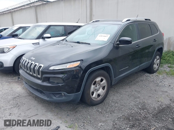 2015 Jeep Cherokee Latitude with VIN 1C4PJLCB9FW627909, listed as a IAAI auction lot 42034667 with 131,739 mi miles and . Bid and sale history available at carsss.com. Image 2.