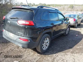 2016 Jeep Cherokee Sport with VIN 1C4PJLAS9GW208334, listed as a IAAI auction lot 41449928 with 163,826 mi miles and . Bid and sale history available at DreamBid. Image 4.