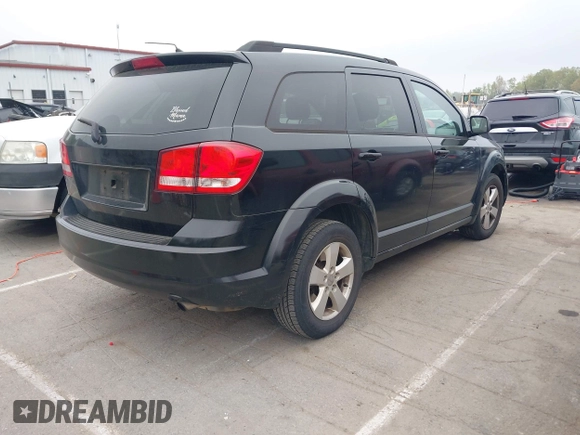 2014 Dodge Journey SE with VIN 3C4PDCAB0ET116863, listed as a IAAI auction lot 41950773 with 183,866 mi miles. Bid and sale history available at carsss.com. Image 4.