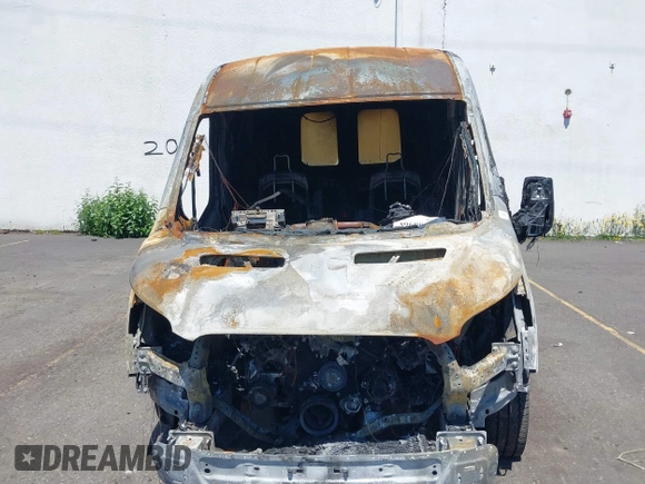 2020 Ford Transit Cargo with VIN 1FTBR1C80LKA75599, listed as a IAAI auction lot 39698416 with Not Provided miles. Bid and sale history available at carsss.com. Image 6.