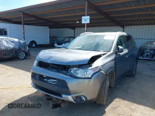 2015 Mitsubishi Outlander GT with VIN JA4JZ4AX1FZ005879, listed as a IAAI auction lot 41701299 with 212,805 mi miles and . Bid and sale history available at DreamBid. Image 6.