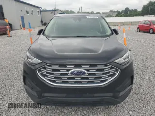 2019 Ford Edge SE z VIN 2FMPK4G94KBB17727, wystawiony jako Copart lot #61060665 z przebiegiem 137 187 mil mil oraz Czysty tytuł • Clean title. Historia ofert i sprzedaży dostępna na DreamBid. Obrazek 5.