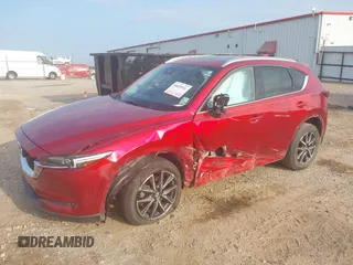 2017 Mazda CX-5 Grand Touring with VIN JM3KFADL8H0189033, listed as a IAAI auction lot 40029931 with 88,933 mi miles and . Bid and sale history available at carsss.com. Image 23.