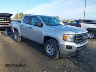2018 GMC Canyon 2WD z VIN 1GTG5BEN5J1290893, wystawiony jako IAAI lot #41292724 z przebiegiem 77 151 mil mil oraz . Historia ofert i sprzedaży dostępna na DreamBid. Obrazek 1.