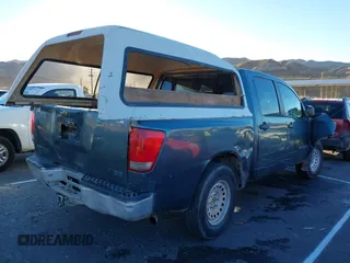 2005 Nissan Titan SE with VIN 1N6AA07A35N540675, listed as a IAAI auction lot 41263861 with 217,785 mi miles and . Bid and sale history available at DreamBid. Image 4.