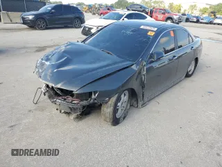 2004 Acura TSX w/Navigation z VIN JH4CL96944C031396, wystawiony jako Copart lot #60472635 z przebiegiem Nie podano mil oraz Szkoda całkowita • Salvage title. Historia ofert i sprzedaży dostępna na DreamBid. Obrazek 9.