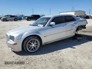 2006 Chrysler 300 C SRT8 with VIN 2C3KA73W76H101950, listed as a Copart auction lot 48501125 with 144,696 mi miles and Salvage Title. Bid and sale history available at carsss.com. Image 1.