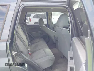 2007 Jeep Grand Cherokee Laredo with VIN 1J8GS48K17C684497, listed as a IAAI auction lot 42136314 with 155,024 mi miles. Bid and sale history available at carsss.com. Image 8.