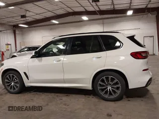 2020 BMW X5 xDrive40i with VIN 5UXCR6C01LLL66648, listed as a IAAI auction lot 42372631 with 59,770 mi miles and . Bid and sale history available at DreamBid. Image 14.