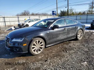 2014 Audi A7 Prestige with VIN WAU2MAFC9EN093287, listed as a Copart auction lot 86430124 with 157,212 mi miles and Salvage title. Bid and sale history available at DreamBid. Image 1.