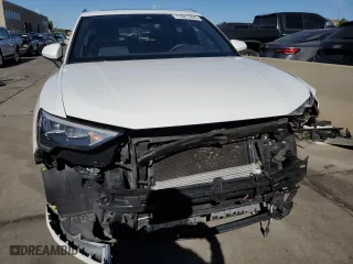 2021 Audi Q3 Premium with VIN WA1AUCF38M1067676, listed as a Copart auction lot 71621704 with 77,395 mi miles and Salvage Title. Bid and sale history available at carsss.com. Image 5.