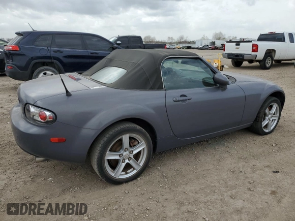 2007 Mazda MX-5 Miata Sport z VIN JM1NC25F970134960, wystawiony jako Copart lot #48422265 z przebiegiem 149 357 mil mil oraz Czysty tytuł • Clean title. Historia ofert i sprzedaży dostępna na DreamBid. Obrazek 3.