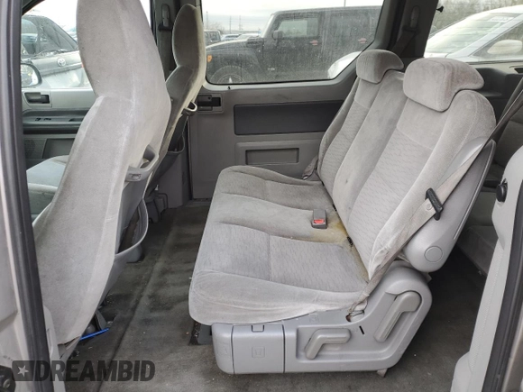 2005 Ford Freestar SE z VIN 2FMZA51665BA67613, wystawiony jako Copart lot #43418315 z przebiegiem Nie podano mil oraz Nie do naprawy. Historia ofert i sprzedaży dostępna na DreamBid. Obrazek 11.