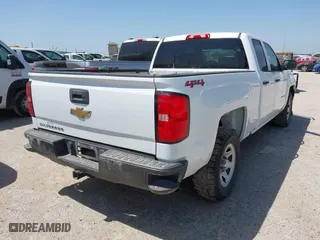 2018 Chevrolet Silverado 1500 Work Truck with VIN 1GCVKNEC4JZ204037, listed as a IAAI auction lot 42002836 with 84,179 mi miles. Bid and sale history available at carsss.com. Image 4.